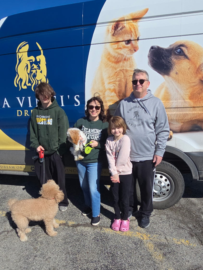 Sheryl with her adoptive family after finding her forever home through Da Vinci’s Dream dog rescue